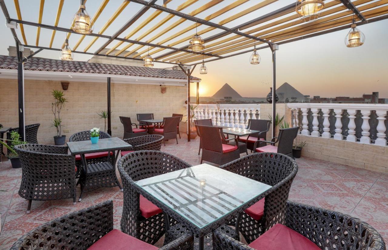 Pyramids Inn Hotel Kafrat al Jabal Bagian luar foto