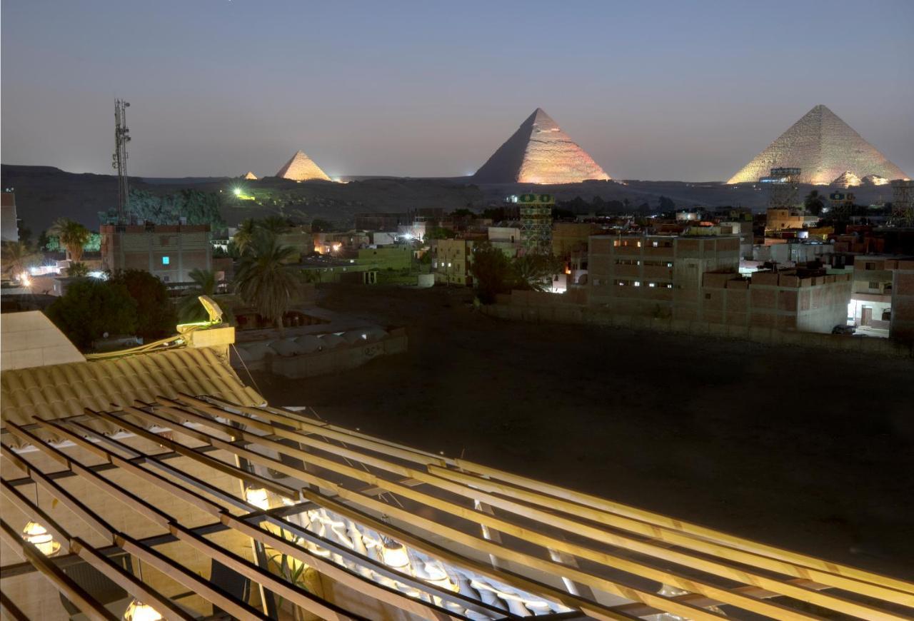 Pyramids Inn Hotel Kafrat al Jabal Bagian luar foto