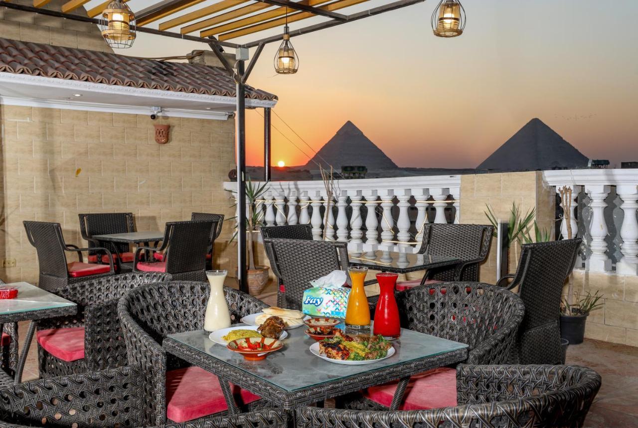 Pyramids Inn Hotel Kafrat al Jabal Bagian luar foto