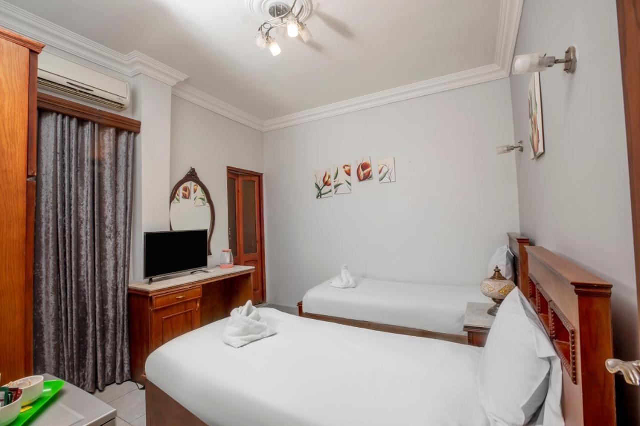Pyramids Inn Hotel Kafrat al Jabal Bagian luar foto