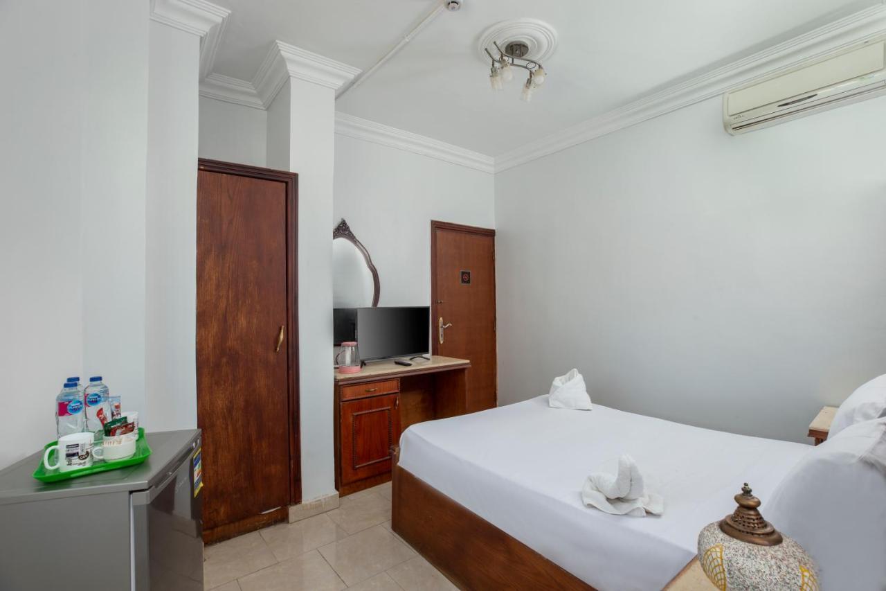 Pyramids Inn Hotel Kafrat al Jabal Bagian luar foto