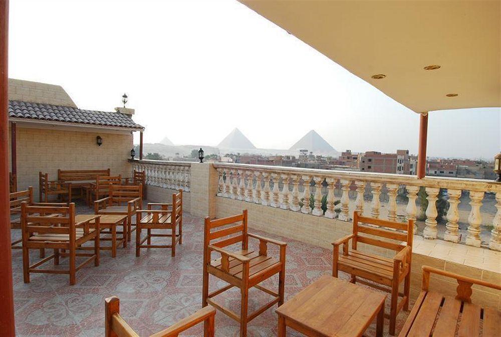 Pyramids Inn Hotel Kafrat al Jabal Bagian luar foto