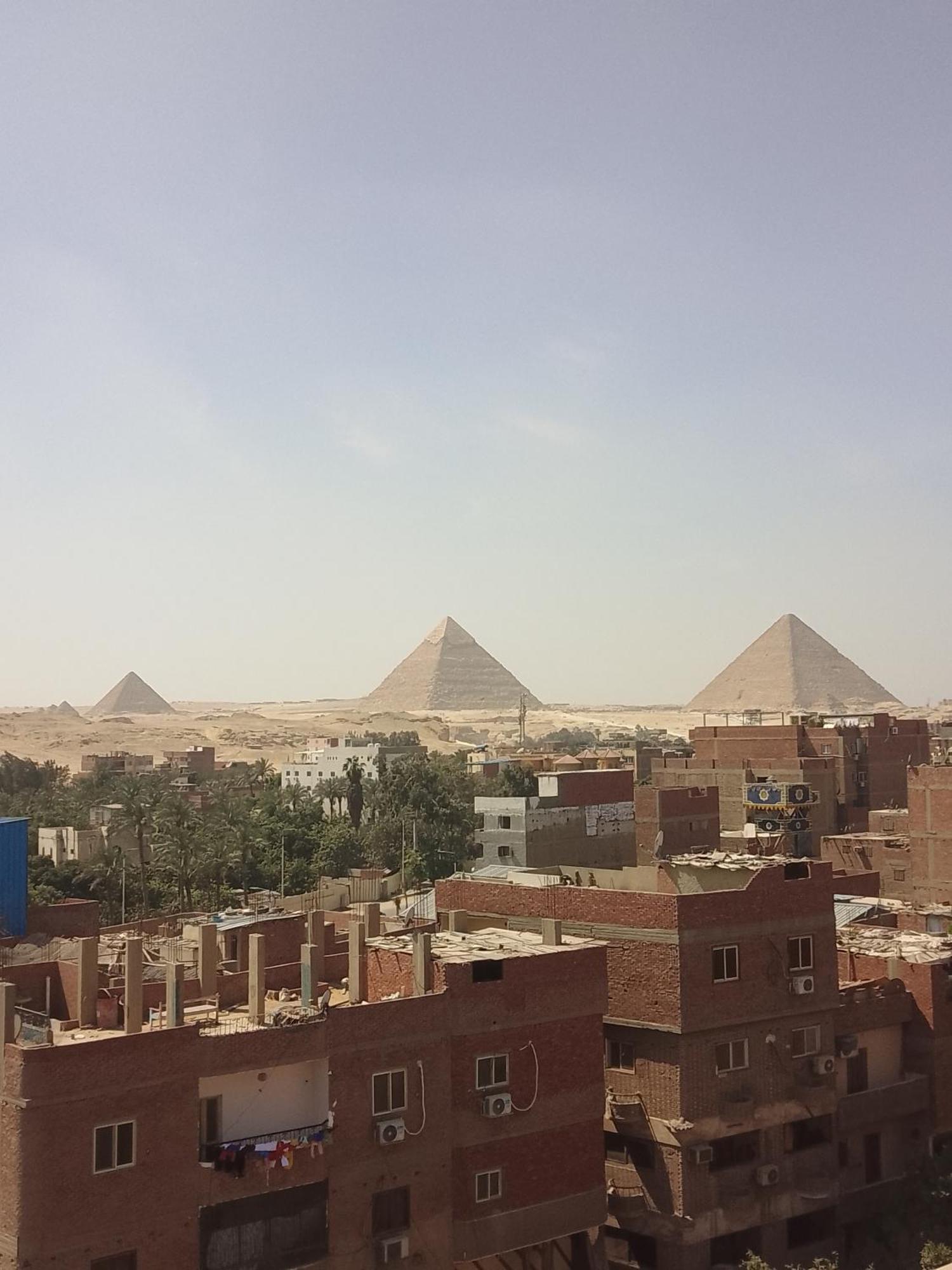 Pyramids Inn Hotel Kafrat al Jabal Bagian luar foto